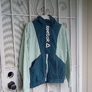 Reebok New Style Windbreaker With Hidden Upper Zipper .